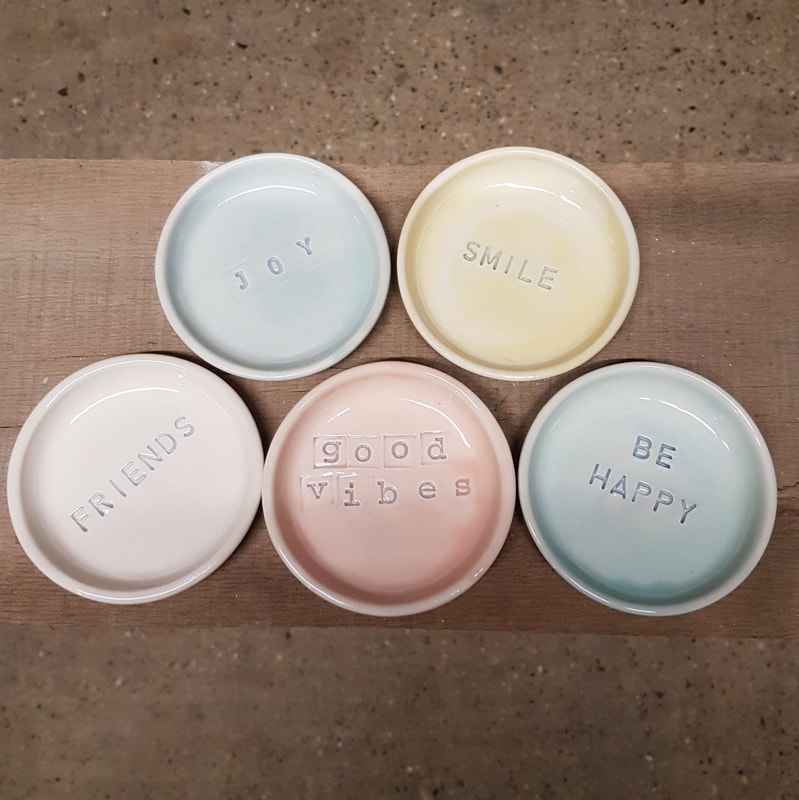 pastel colour small plates, friends, joy, smile, good vibes and be happy
