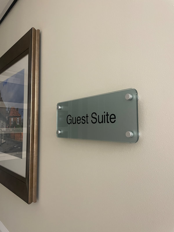glass sign 'guest suite' at churchill retirement living