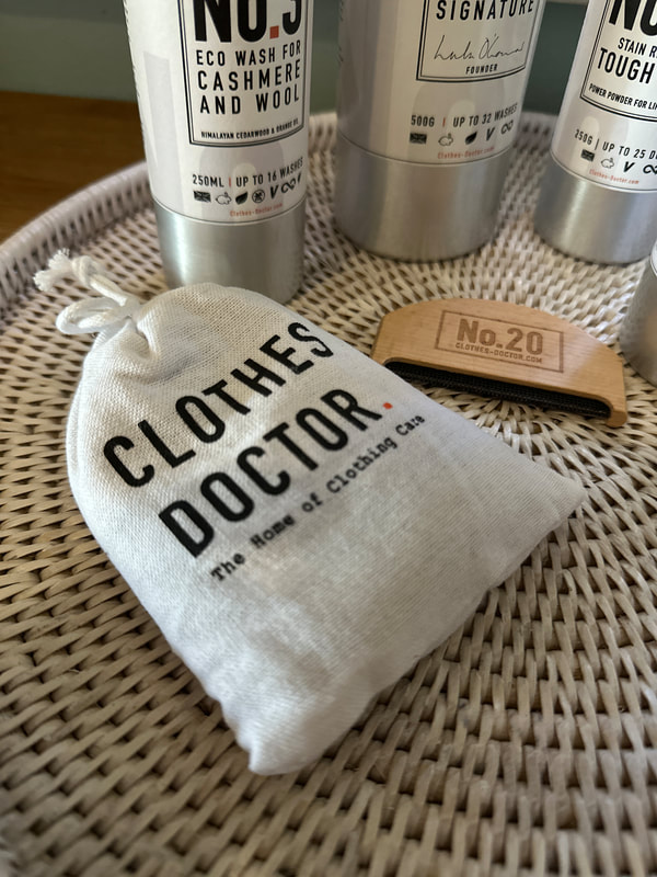 Natural moth repellant from Clothes Doctor a white fabric bag with clothes doctor written in black.