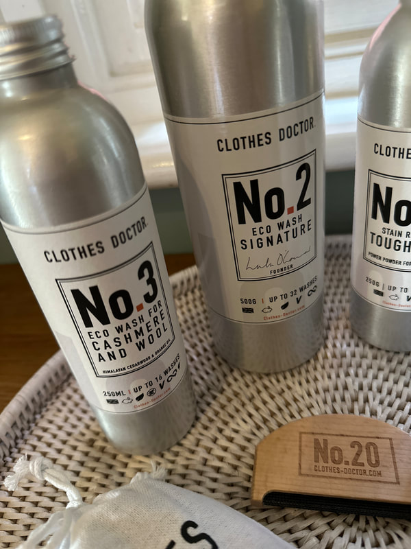 silver bottles containing eco-friendly laundry detergent