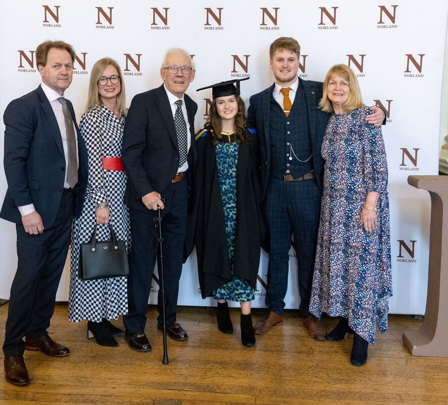 Family group celebrating a Norland College Graduation Day