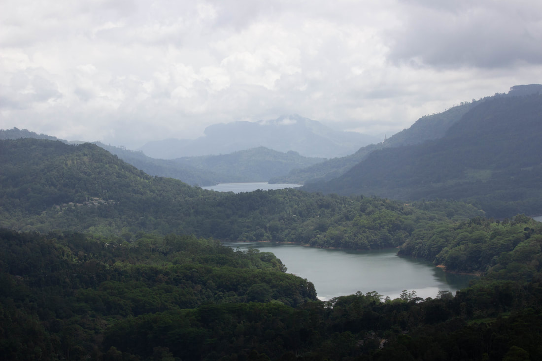 view of hills and lake tea plantations sri lanka