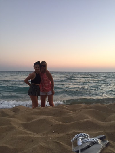 mother and daughter on beach kefalonia