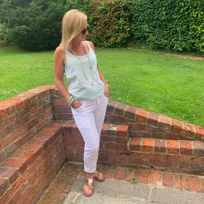 cotton vest, white trousers, capsule wardrobe for holidays