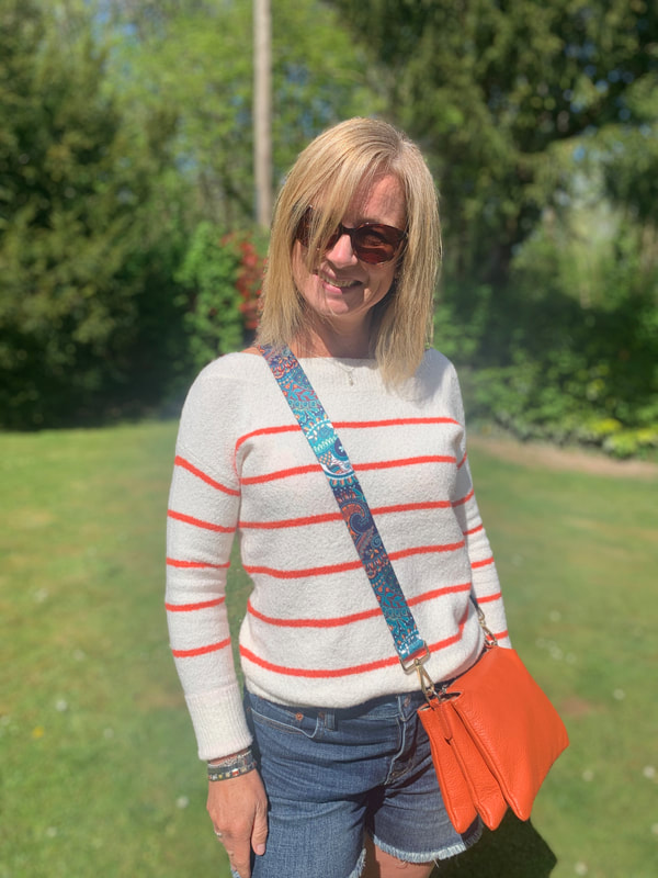 orange cross body bag from love the wendy house