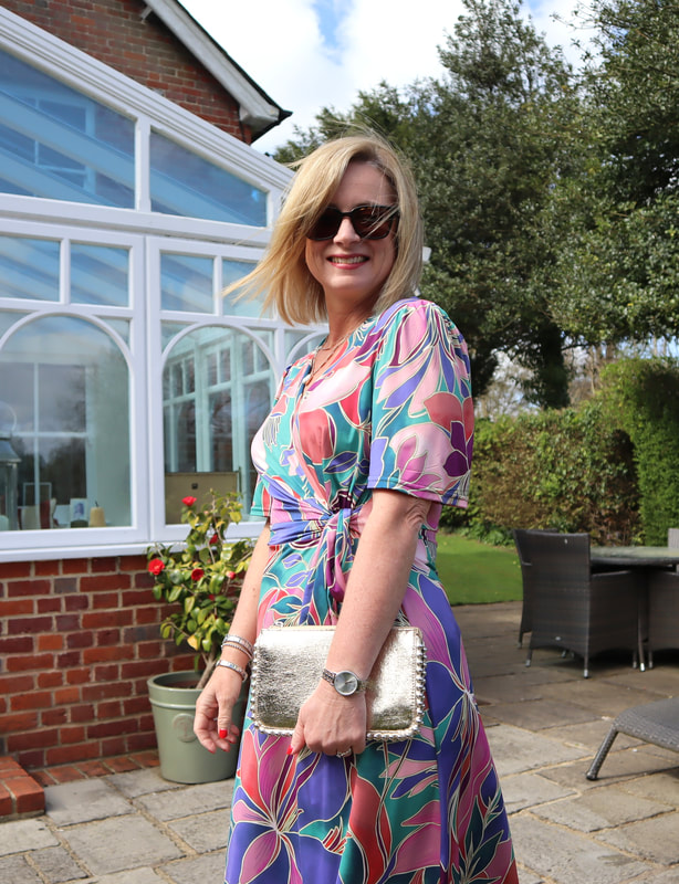Michelle in the garden wearing afibel summer dresses for women over 50