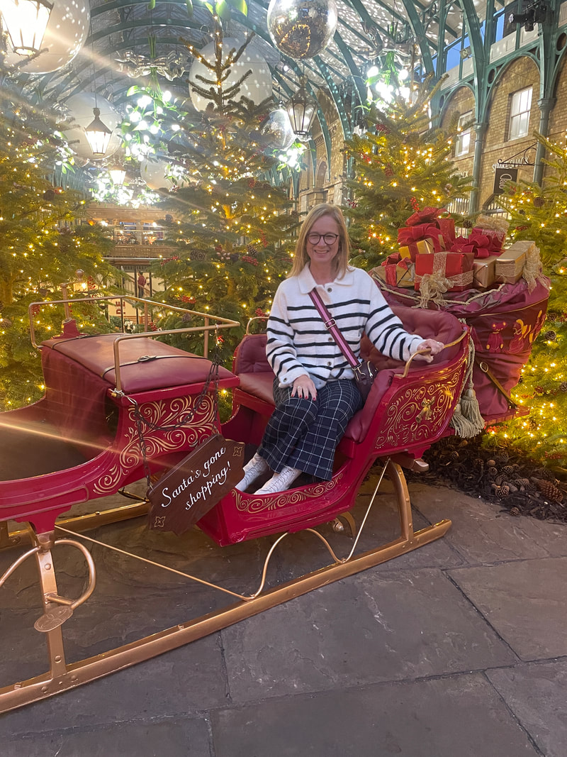 Michelle in the santa sleigh at covent garden