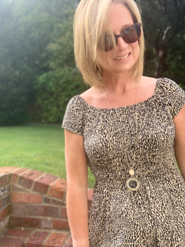 animal print jumpsuit, outfit ideas, style for women over 50