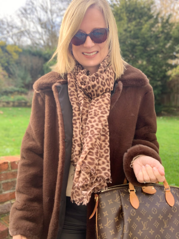 fabulous at 50, faux fur coat and animal print scarf
