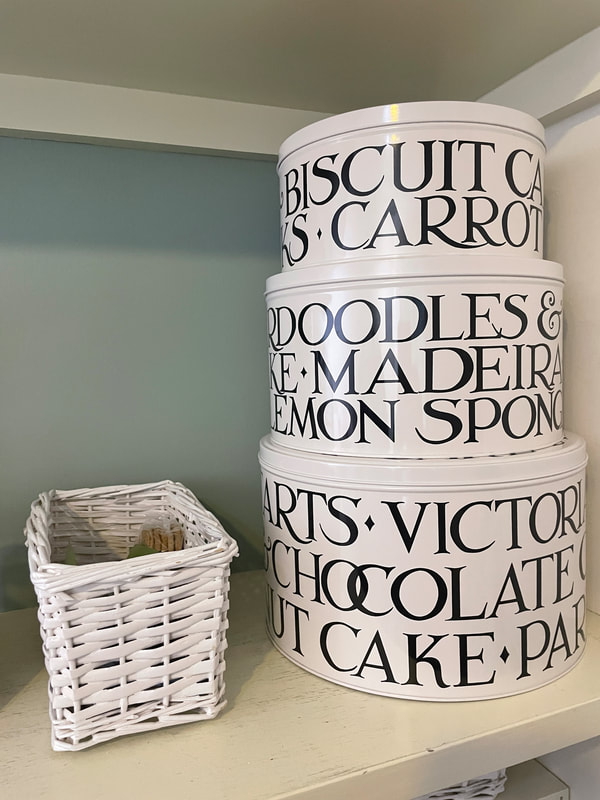 biscuit tins and utility room storage