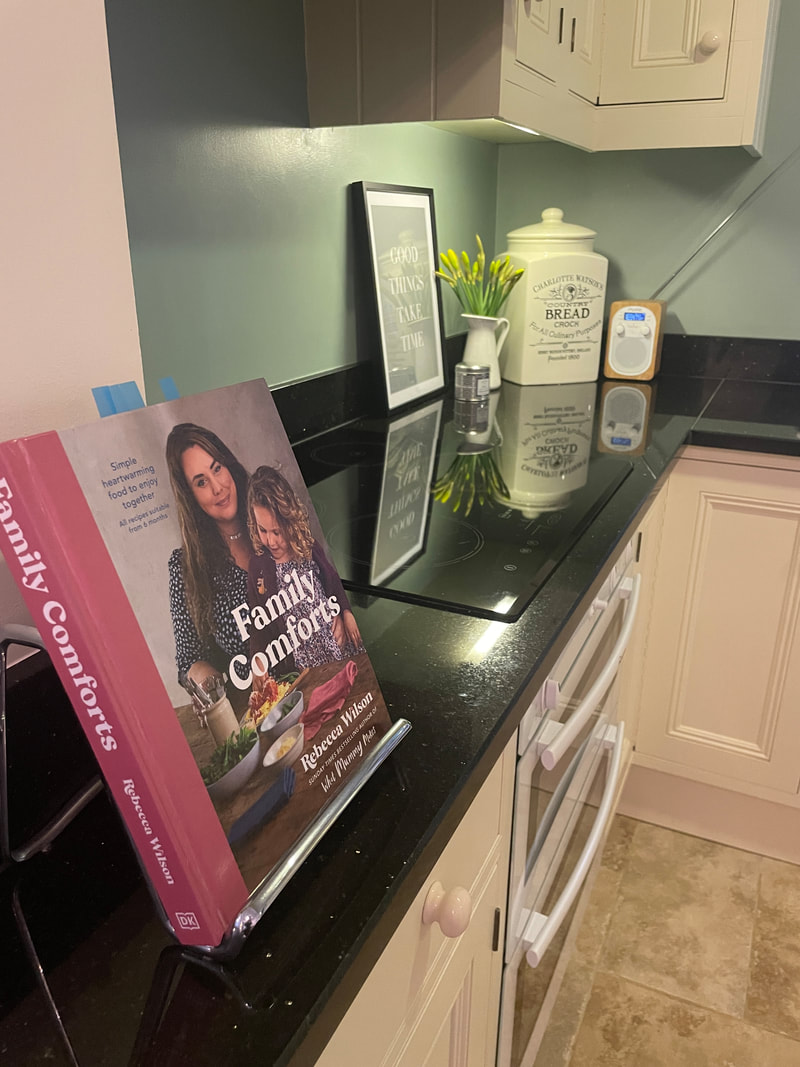 Recipe book on a stand in kitchen