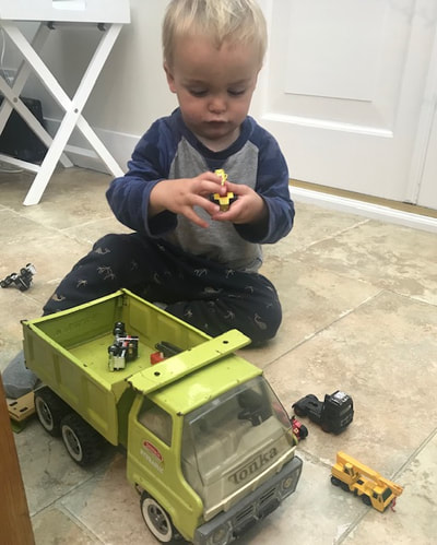 playing with tonka truck