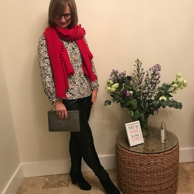 evening out outfit with black and white and bright red scarf