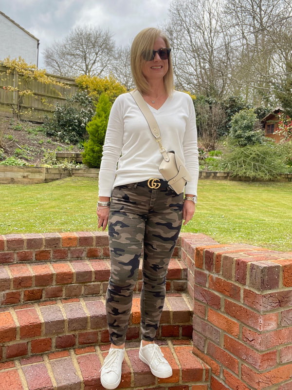 Styling camo jeans with cream jumper