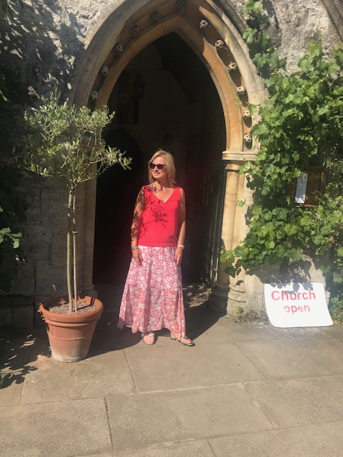 woman in summer outfit outside church