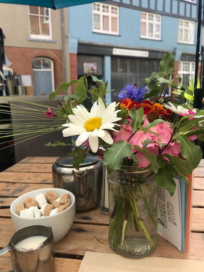 Flowers on table at Cafe Alf Resco Dartmouth