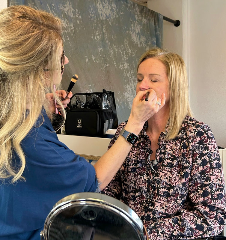 Joanne is applying concealer to Michelle | Makeup tutorial for women over 50