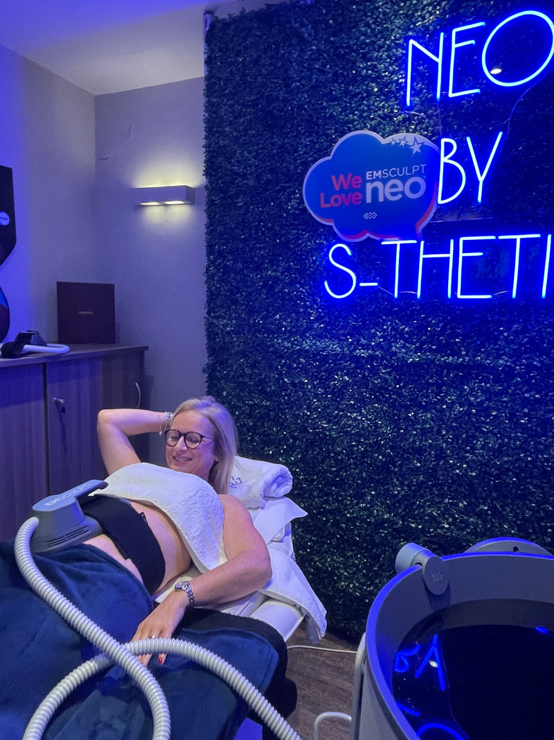 Michelle at S-Thetics having an EMSculpt NEO treatment on her abdominals