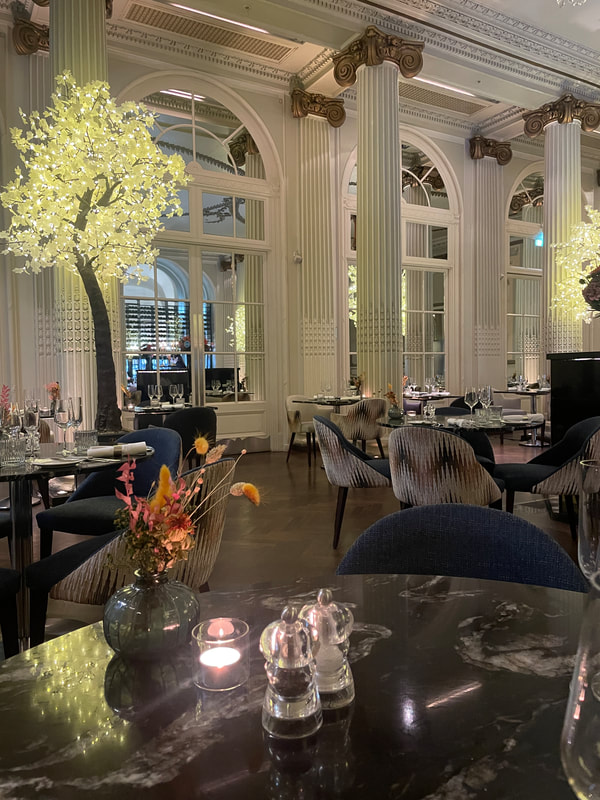 view of the homage restaurant at the waldorf