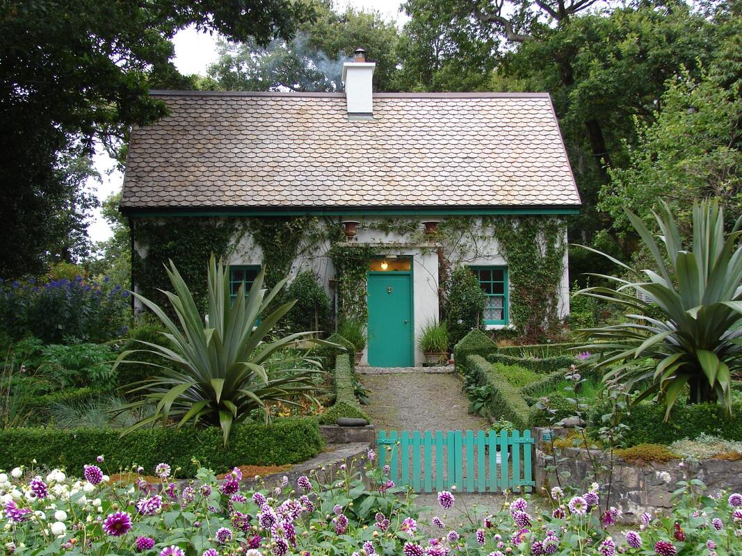 Pretty cottage with green front door